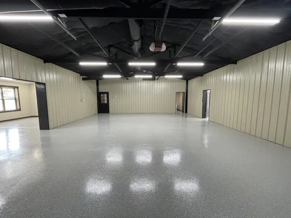 a view of a empty room with windows