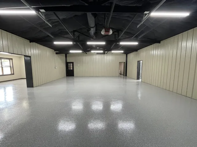 a view of a empty room with windows