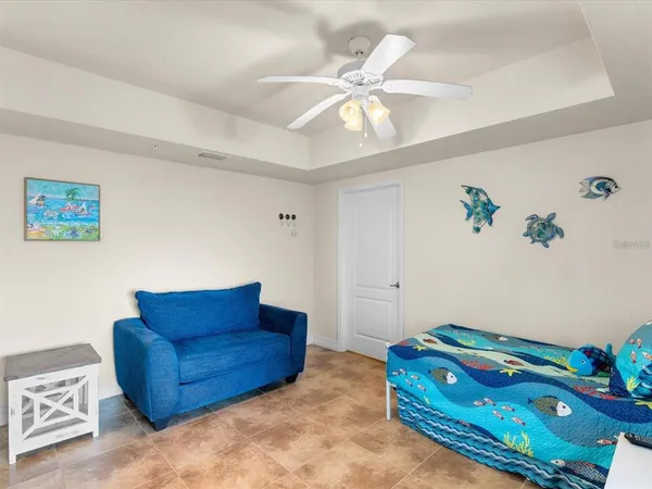 a room with furniture and a chandelier