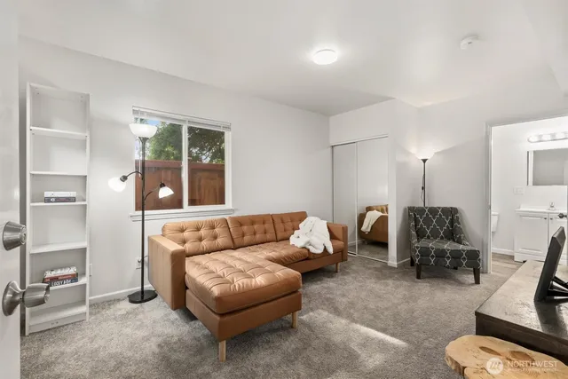 a living room with furniture and a table