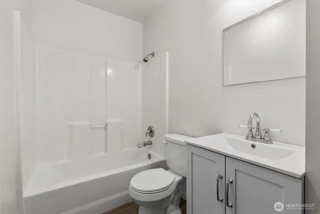a bathroom with a sink toilet and a bathtub