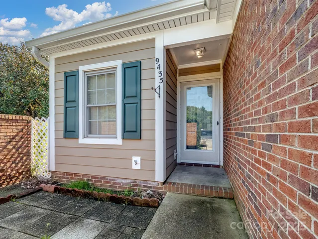 a view of entrance door of a house