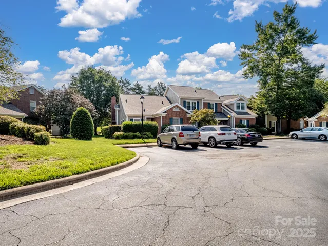a view of a street with cars