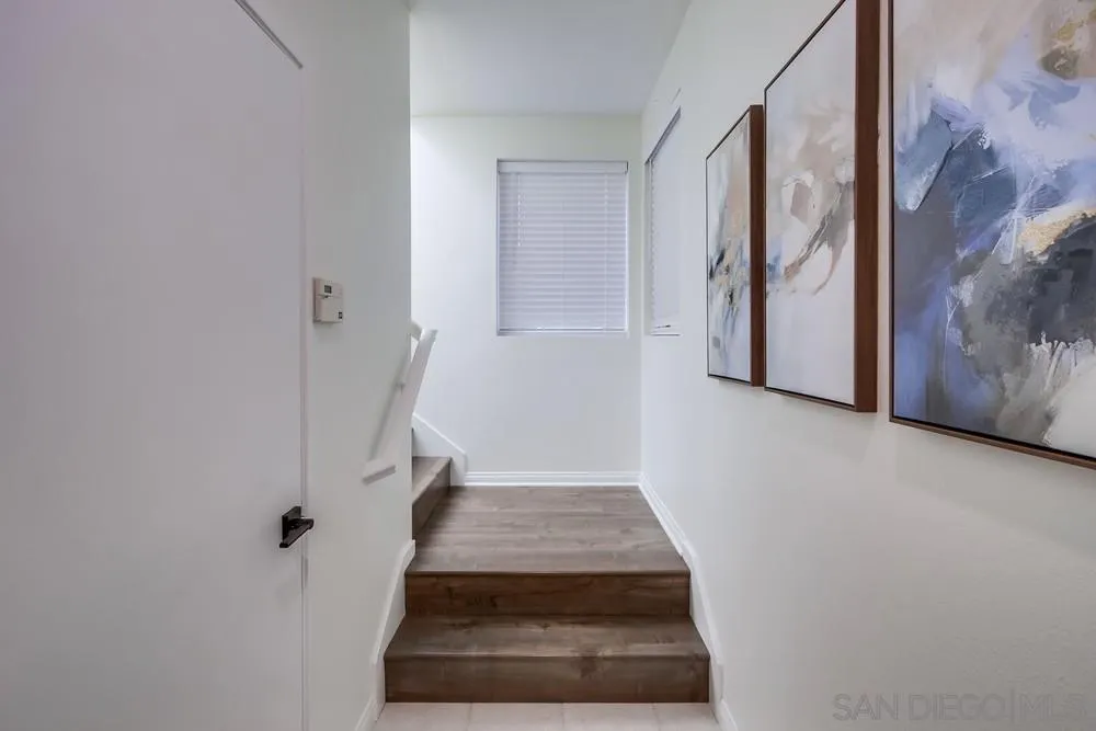 12490 Heatherton Court, Unit 10 San Diego, CA 92128 - Photo 31 of 39 a view of an entryway with staircase