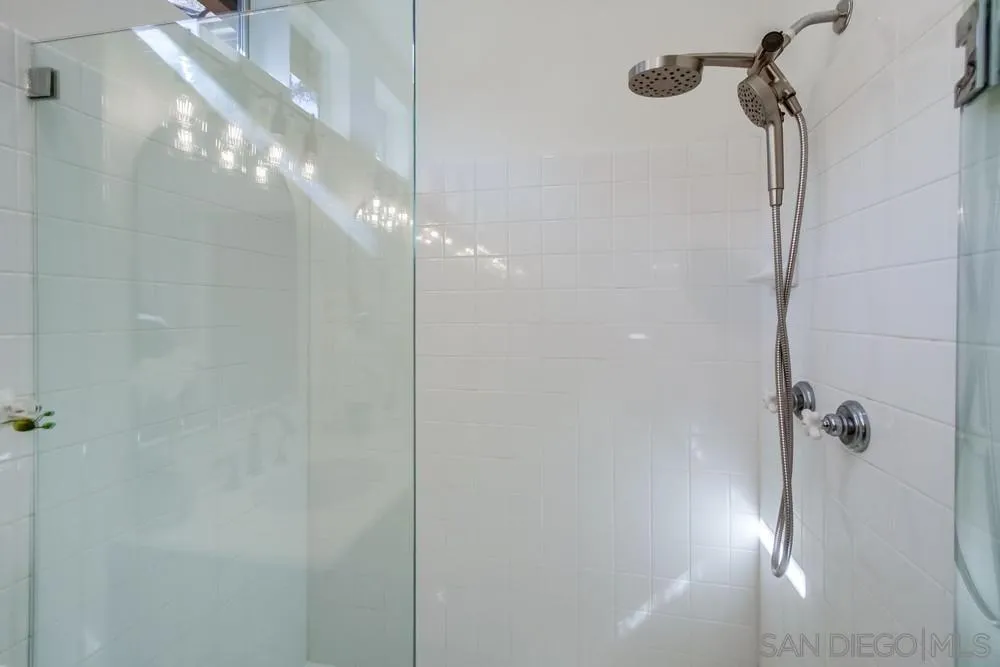 12490 Heatherton Court, Unit 10 San Diego, CA 92128 - Photo 37 of 39 a view of a bathroom with a shower
