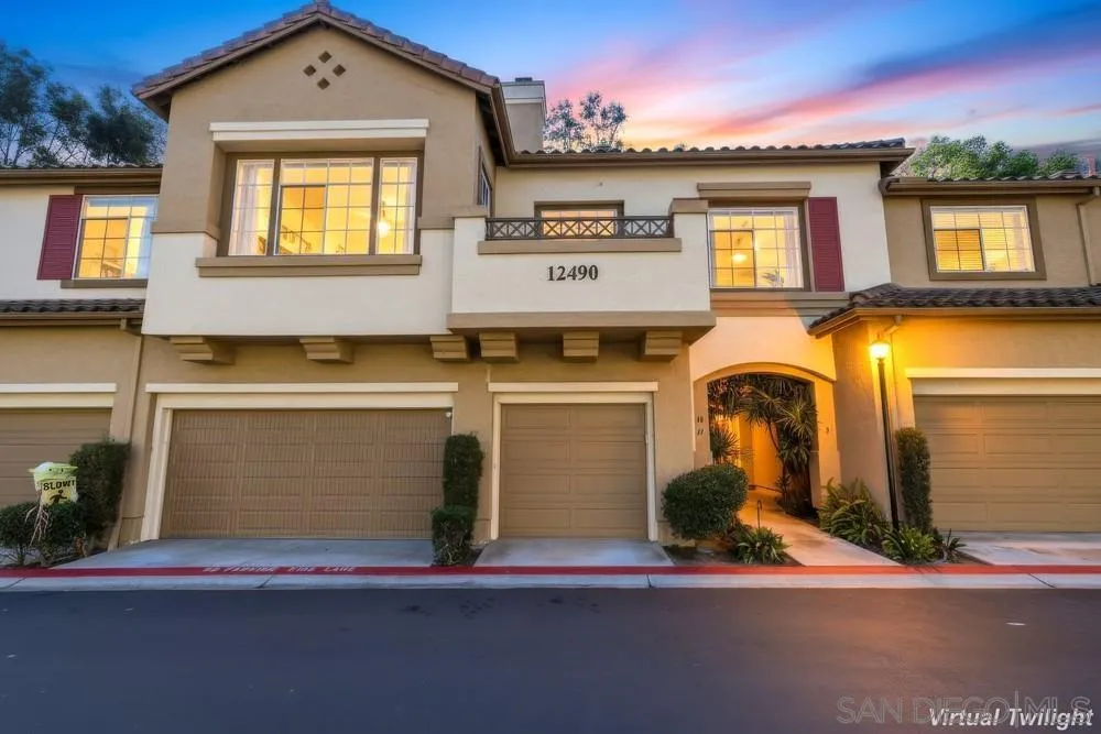 12490 Heatherton Court, Unit 10 San Diego, CA 92128 - Photo 38 of 39 a front view of a house with a garage