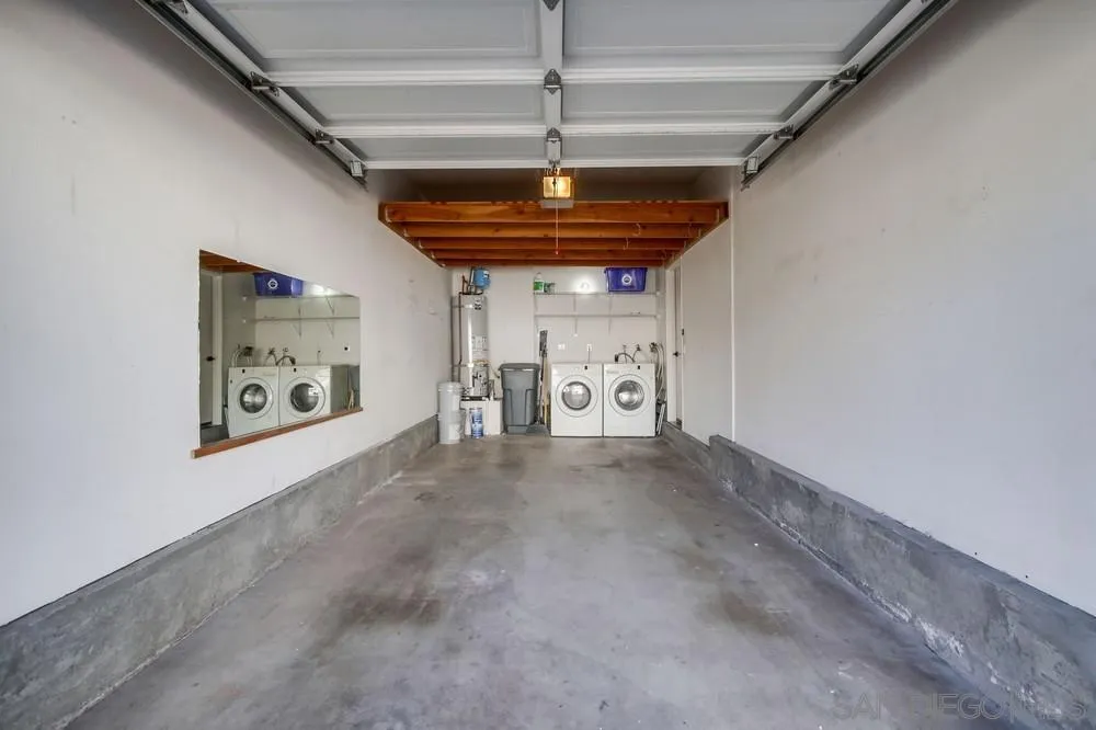 12490 Heatherton Court, Unit 10 San Diego, CA 92128 - Photo 39 of 39 a view of a hallway with stairs