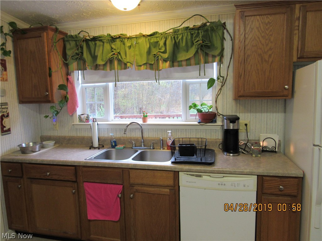 4502 Tower Road Dorset, OH 44032 - Photo 2 of 16 Nice big window for nature watching while doing dishes!