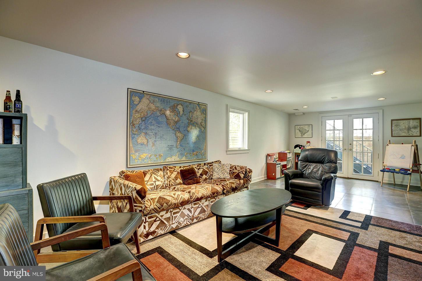 7215 Arrowood Road Bethesda, MD 20817 - Photo 22 of 30 Lower Level Recreation Room with Fireplace
