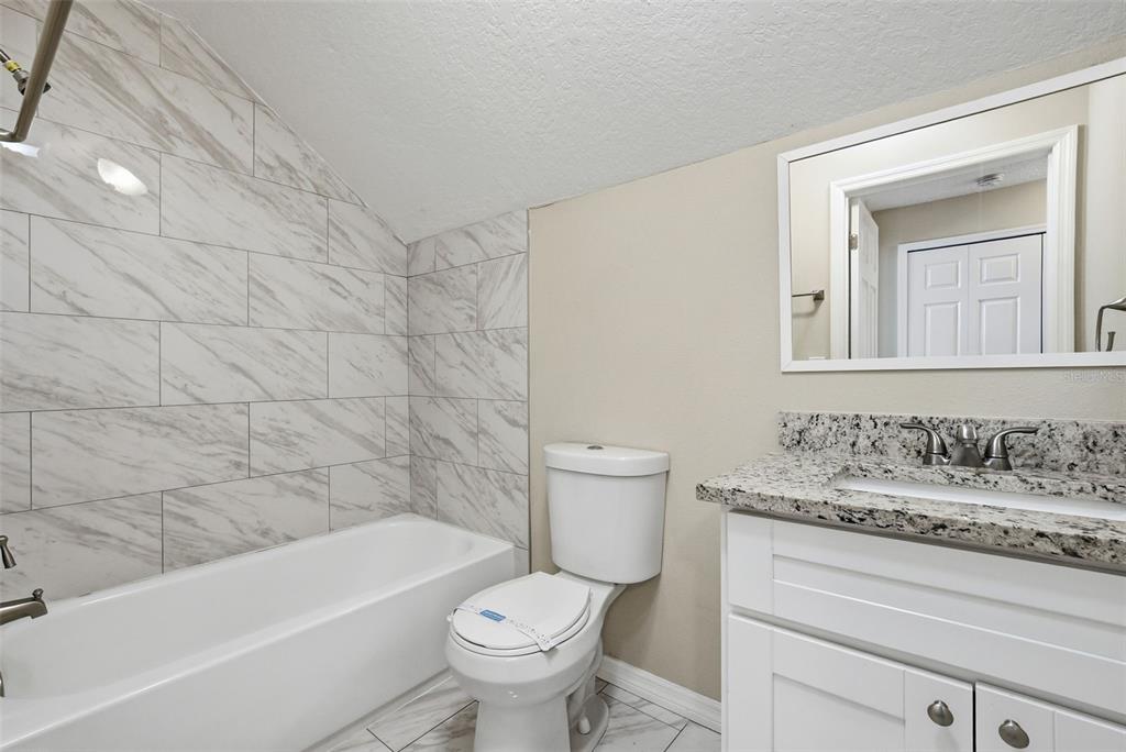 617 Greys Ferry Road Orlando, FL 32811 - Photo 28 of 35 a bathroom with a sink toilet and bathtub