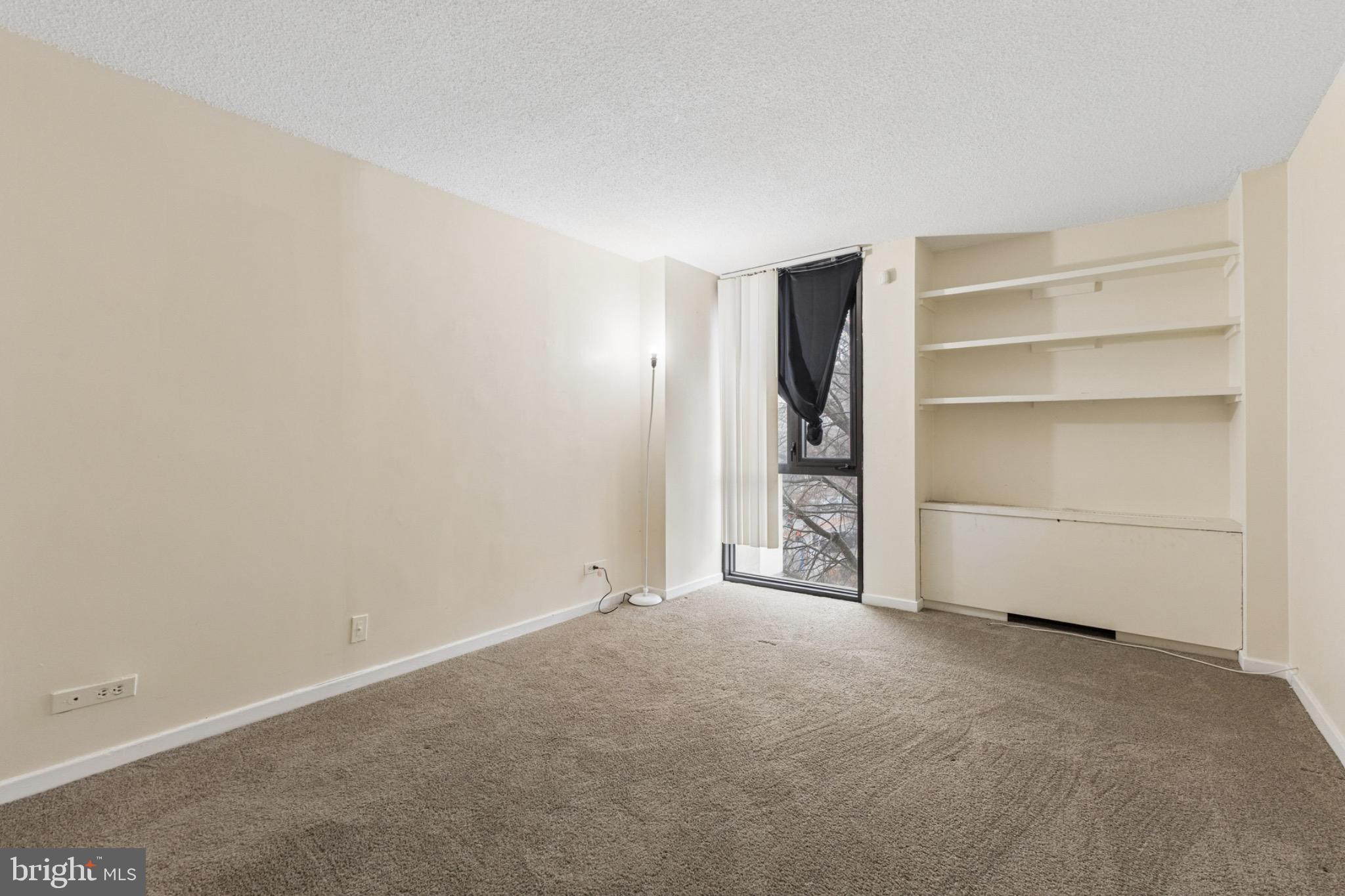 1250 4th Street Southwest, Unit W214 Washington, DC 20024 - Photo 12 of 29 Spacious room with natural light potential.