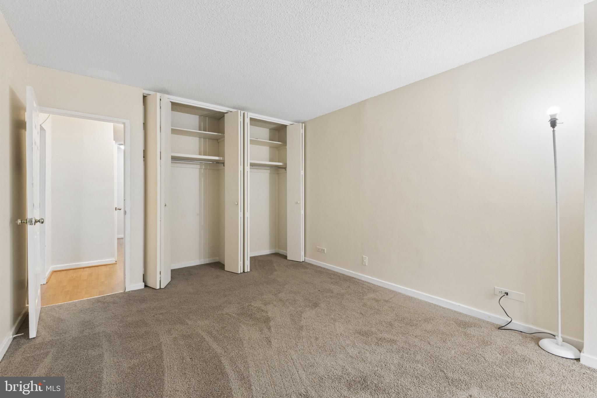1250 4th Street Southwest, Unit W214 Washington, DC 20024 - Photo 13 of 29 Spacious room with ample closet space.