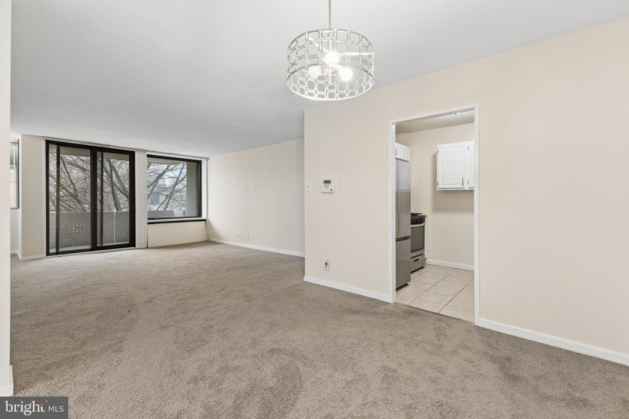 1250 4th Street Southwest, Unit W214 Washington, DC 20024 - Photo 5 of 29 Spacious living area with natural light.