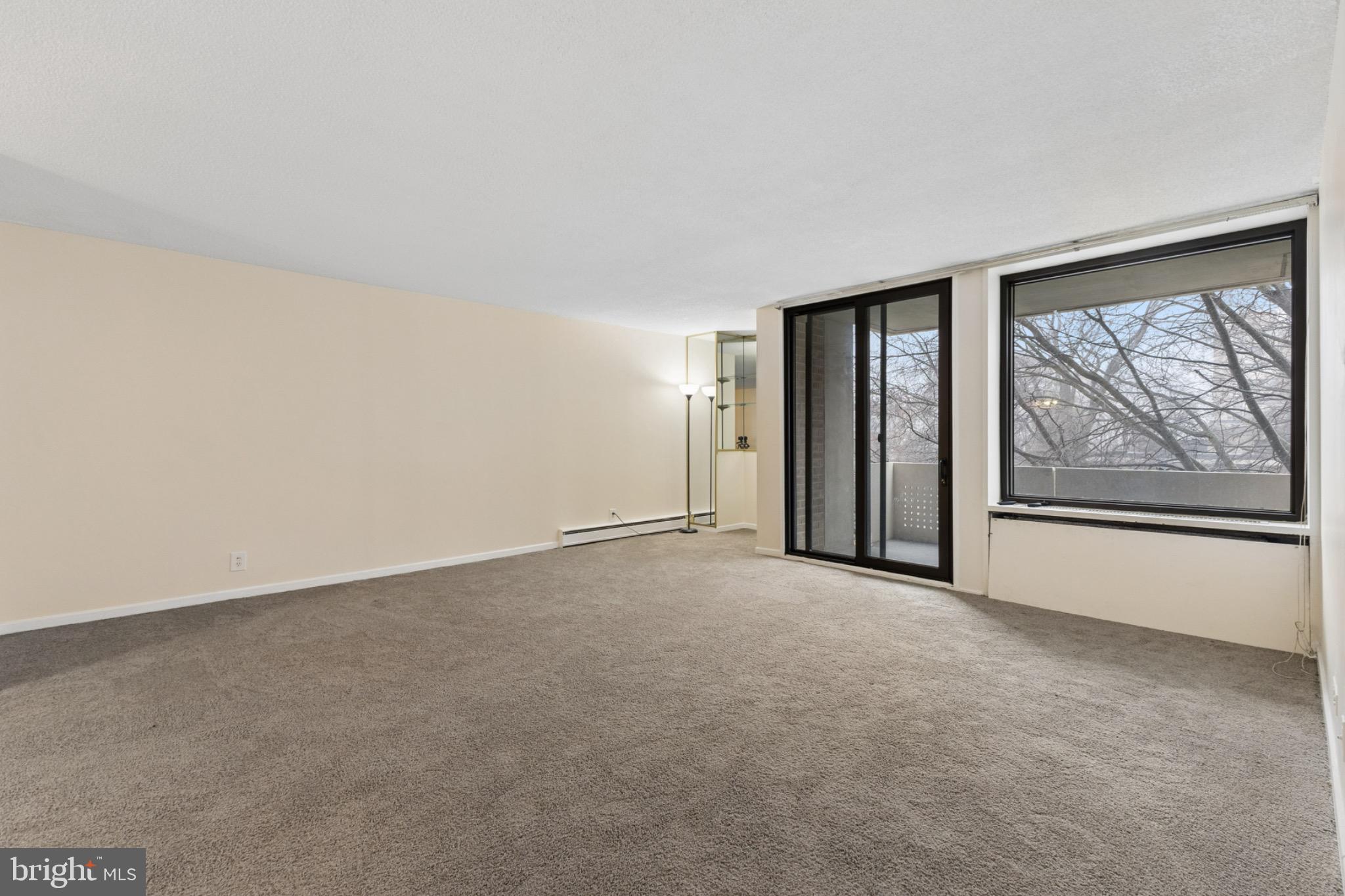 1250 4th Street Southwest, Unit W214 Washington, DC 20024 - Photo 6 of 29 Spacious, light-filled living area awaits you.