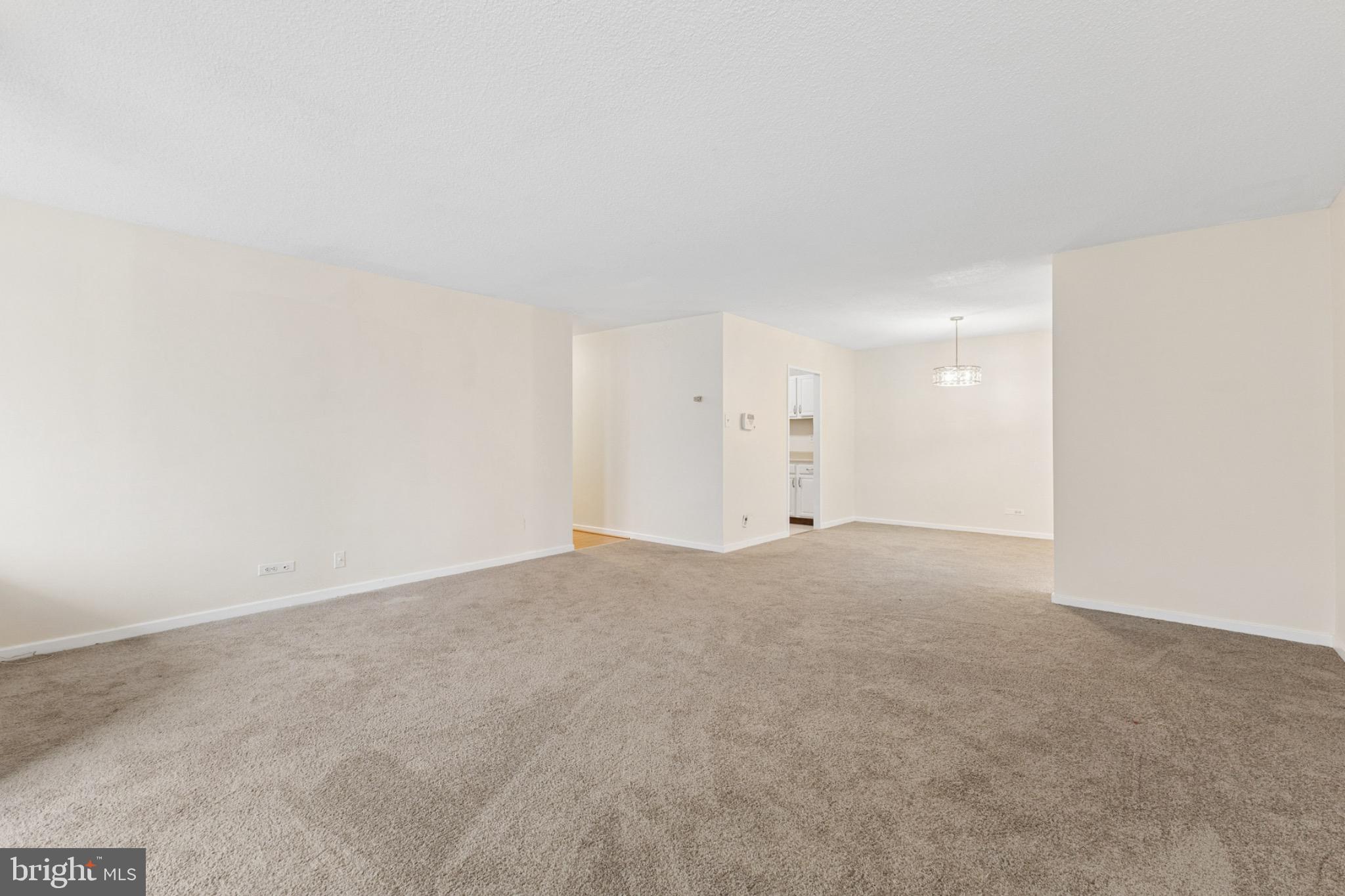 1250 4th Street Southwest, Unit W214 Washington, DC 20024 - Photo 7 of 29 Spacious, light-filled living area awaits you.