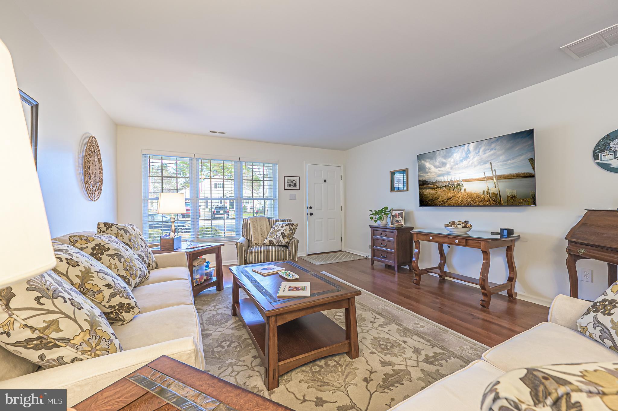 19 Gasko Road Mays Landing, NJ 08330 - Photo 12 of 32 a living room with furniture a rug and a flat screen tv
