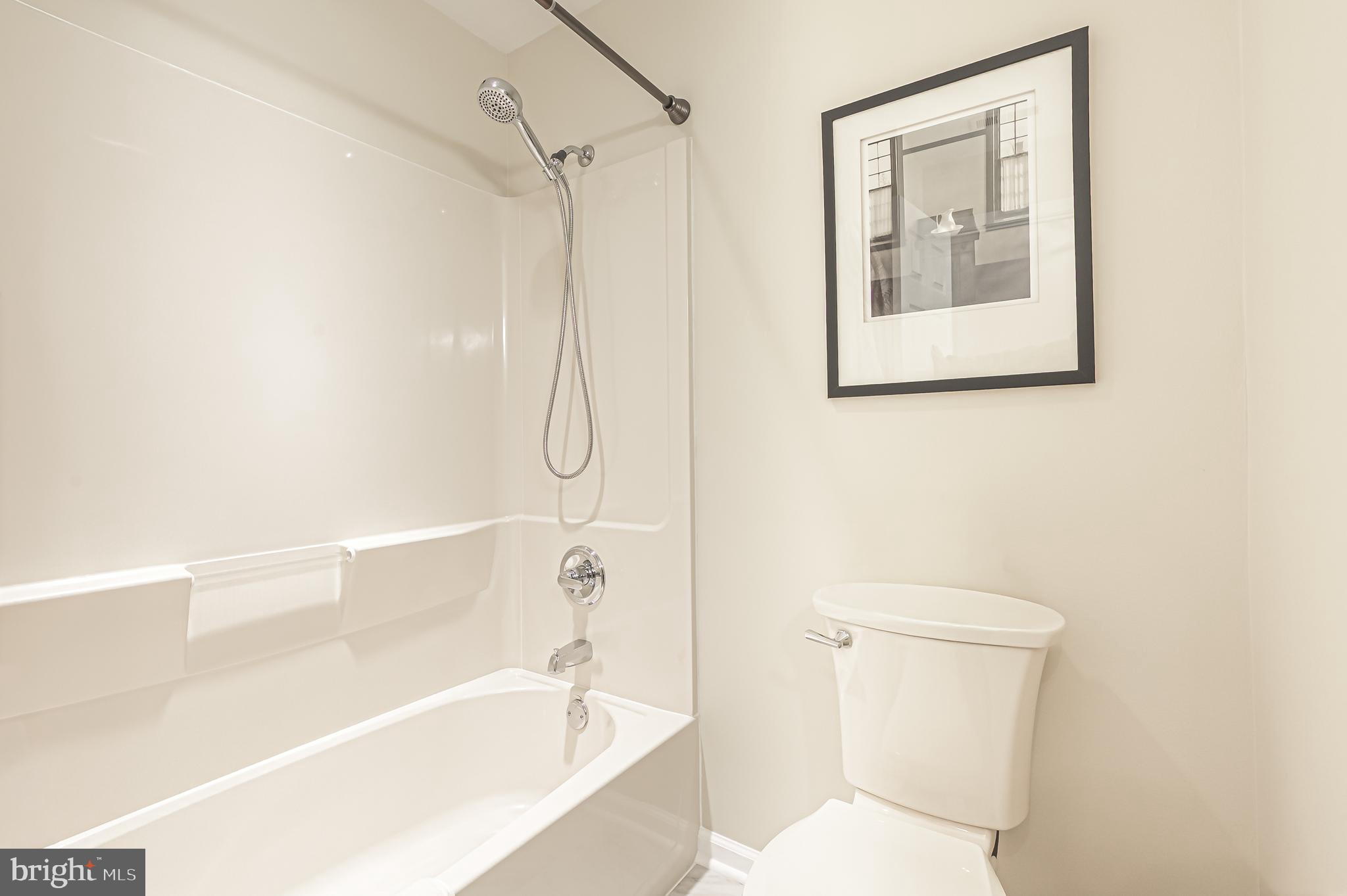 19 Gasko Road Mays Landing, NJ 08330 - Photo 26 of 31 a white bath tub sitting next to a white toilet