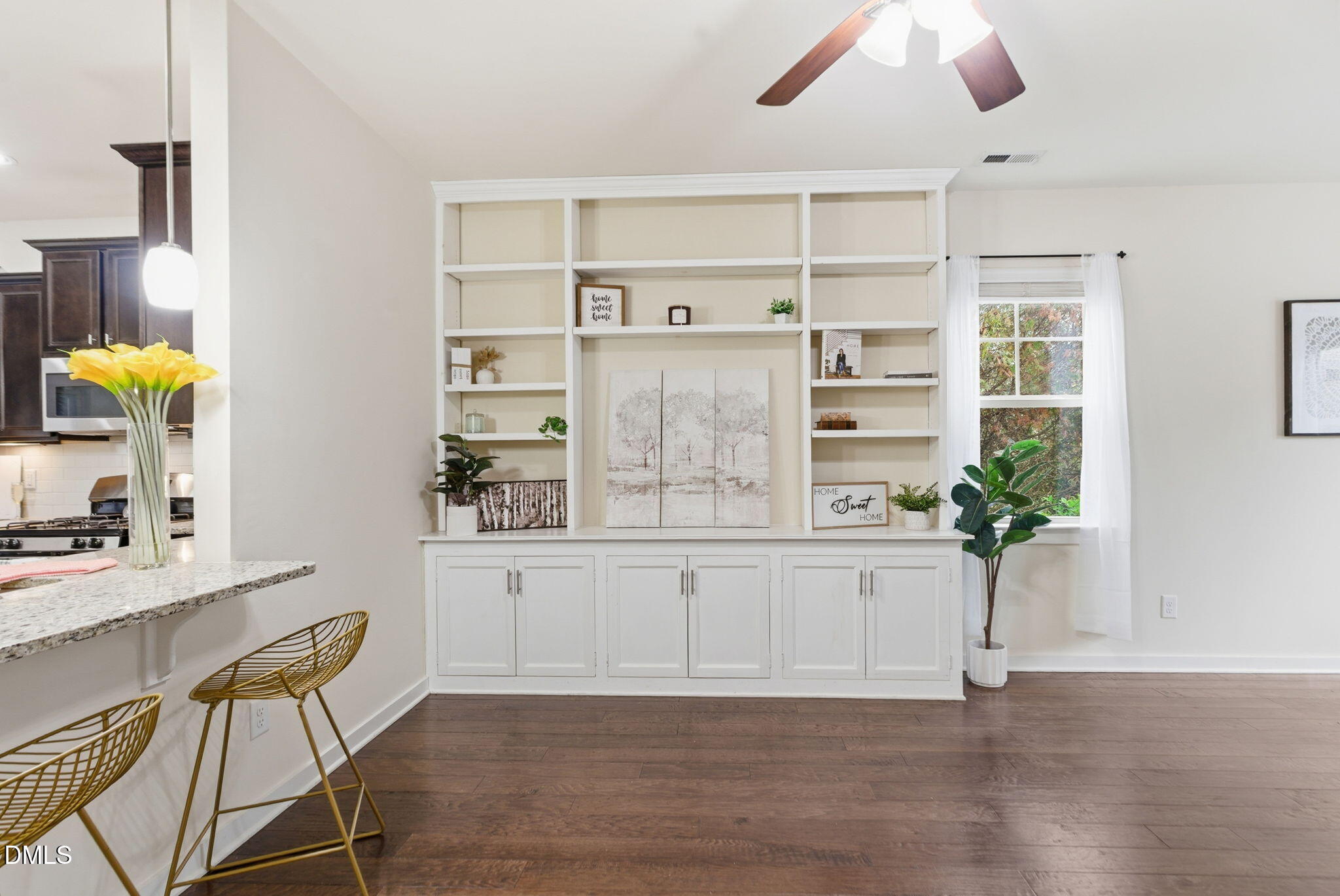 7851 Allscott Way Raleigh, NC 27612 - Photo 18 of 74 a view of kitchen with furniture and wooden floor