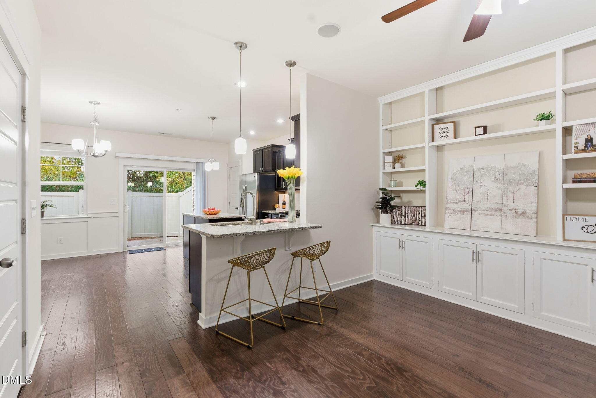 7851 Allscott Way Raleigh, NC 27612 - Photo 35 of 74 a view of kitchen with wooden floor and window