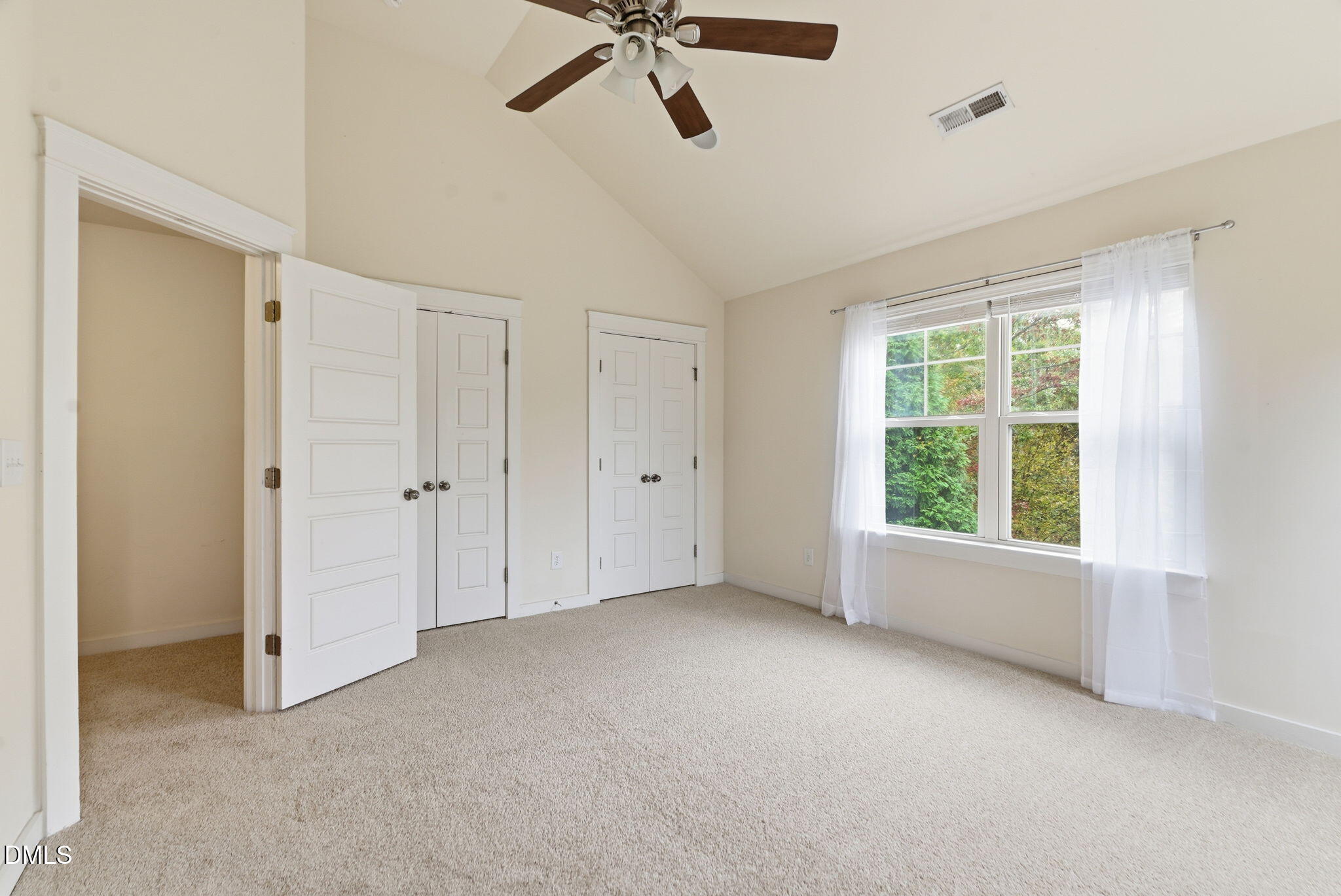 7851 Allscott Way Raleigh, NC 27612 - Photo 45 of 74 a view of an empty room with a window