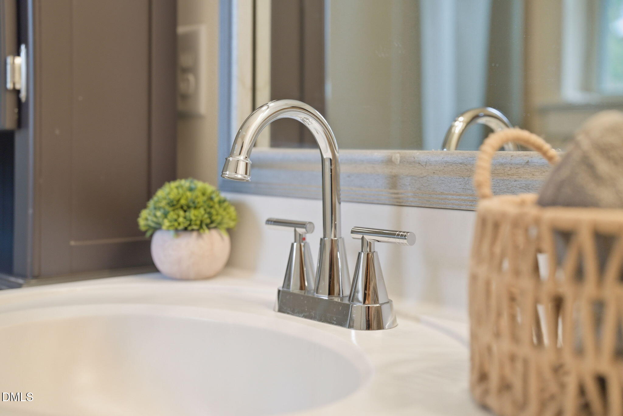 7851 Allscott Way Raleigh, NC 27612 - Photo 49 of 74 a close view of sink and tap