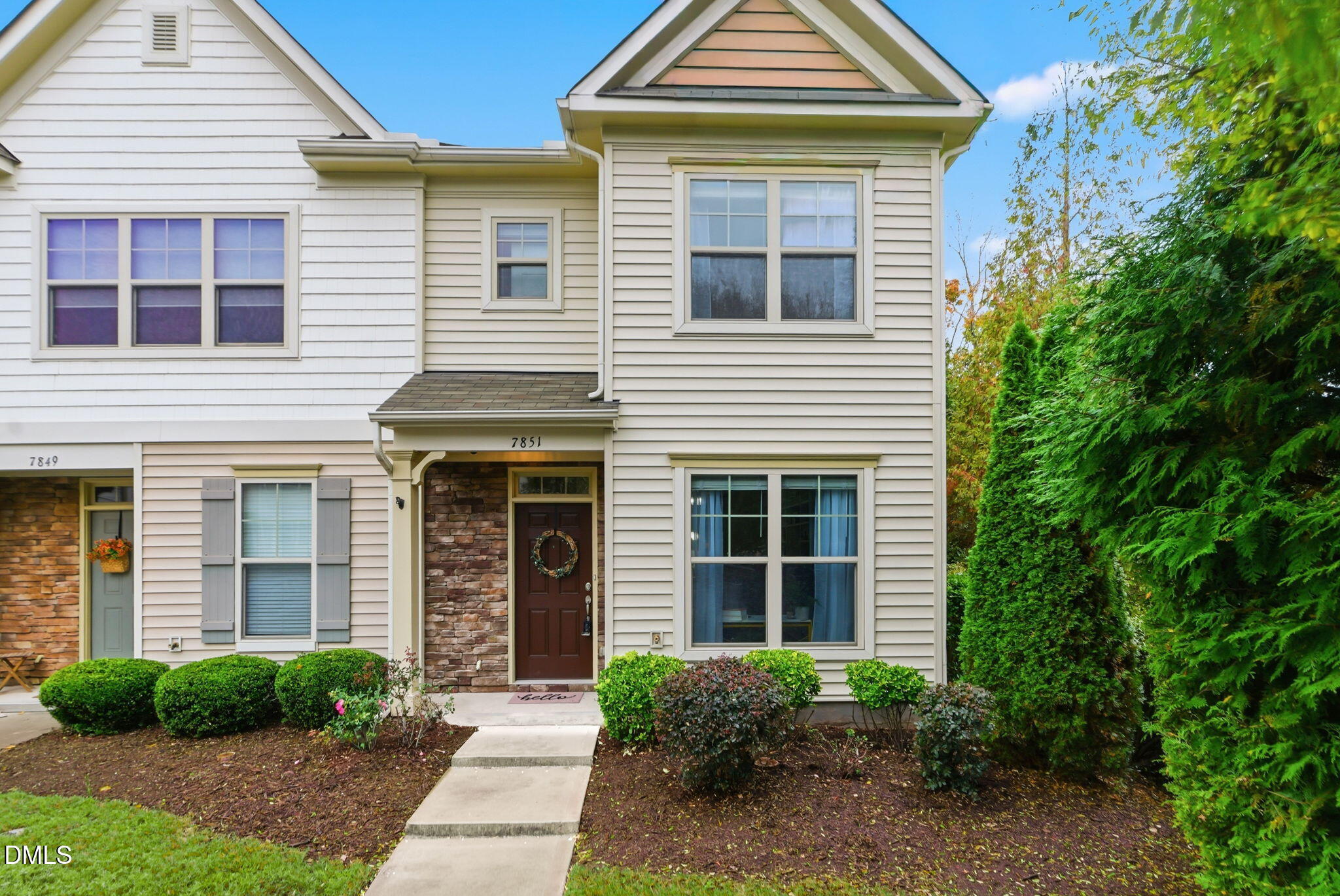 7851 Allscott Way Raleigh, NC 27612 - Photo 58 of 74 a front view of a house with garden