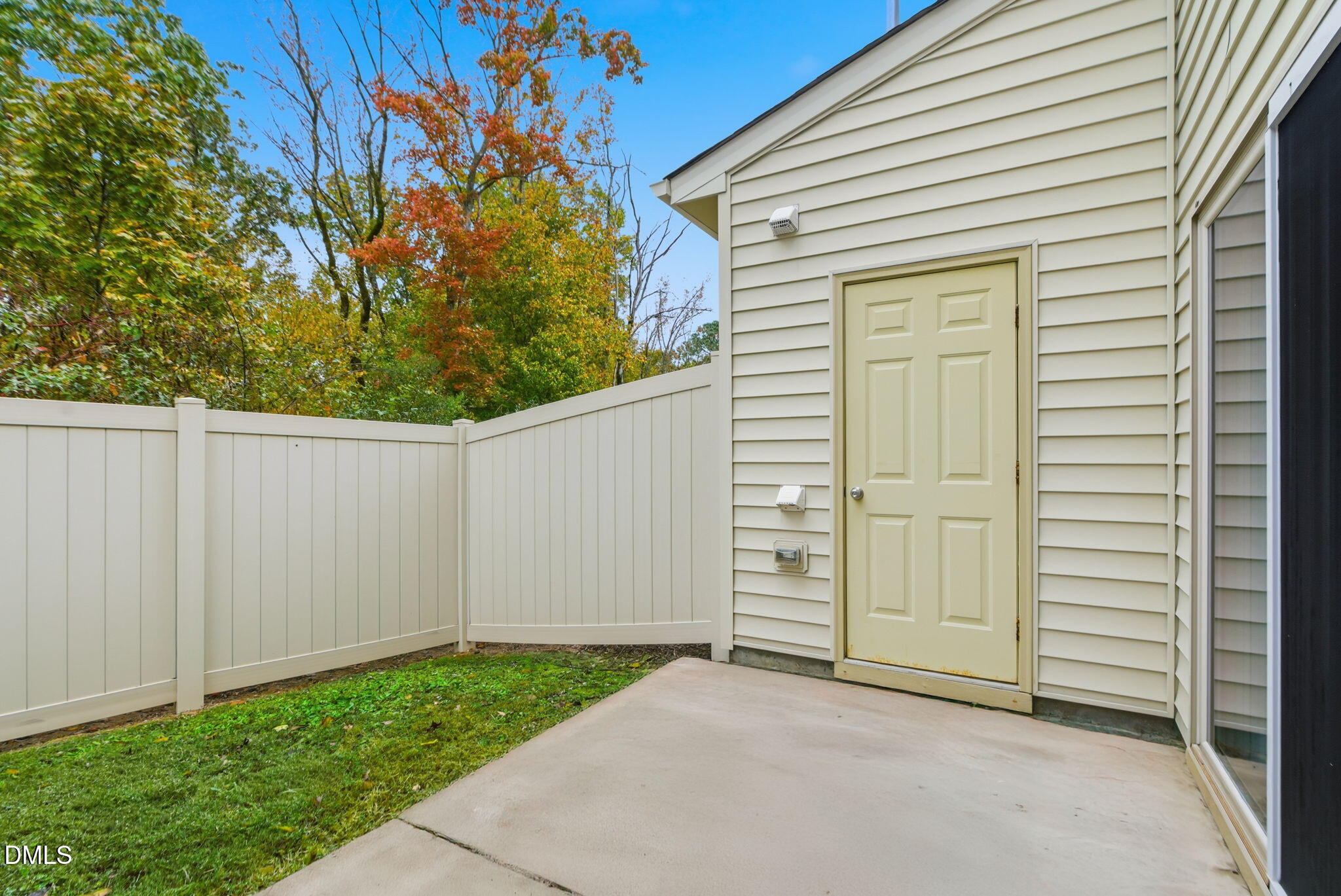 7851 Allscott Way Raleigh, NC 27612 - Photo 62 of 74 an empty room with yard and a garage