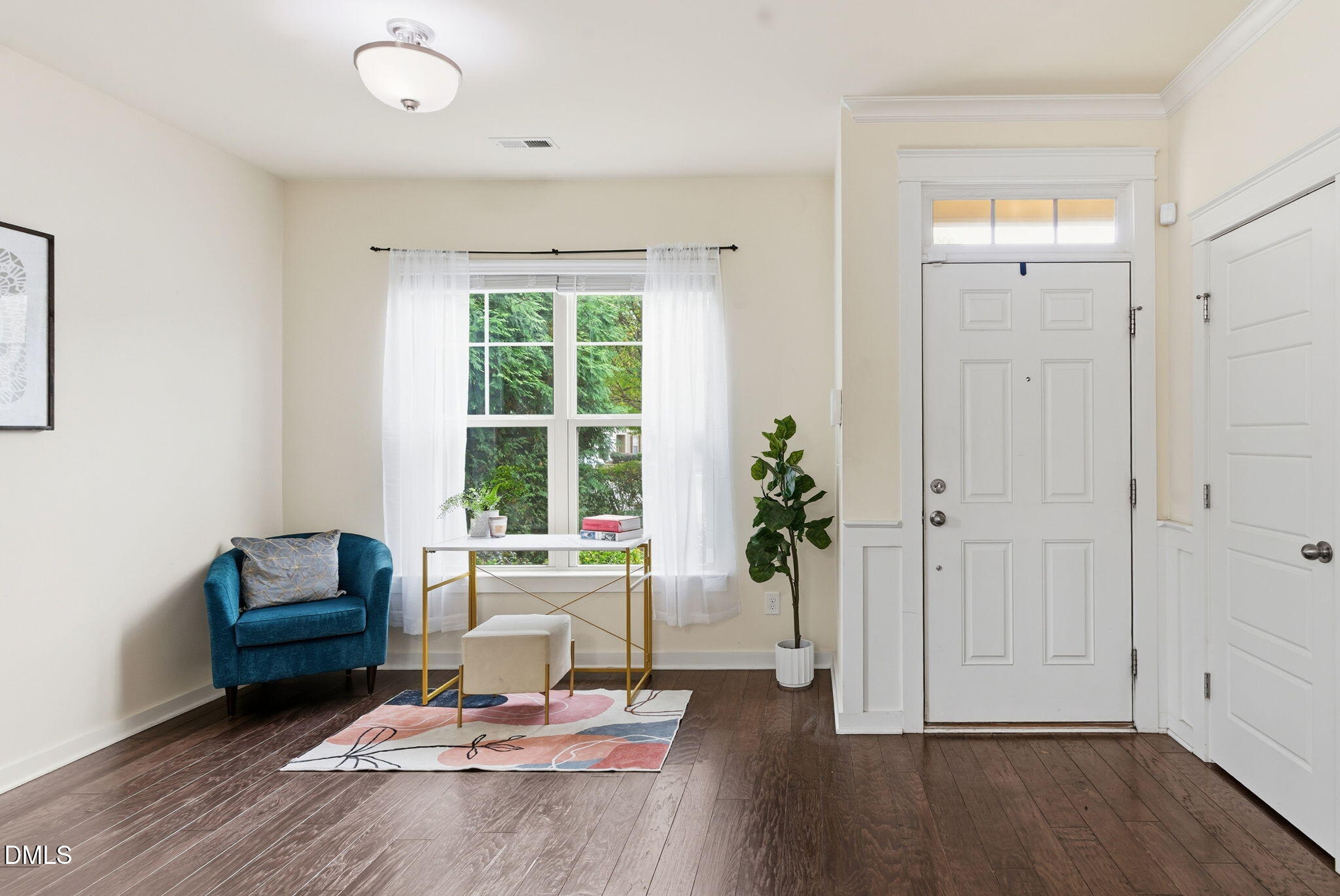 7851 Allscott Way Raleigh, NC 27612 - Photo 7 of 74 a living room with furniture and a window