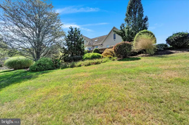 a view of an entryway with hardwood floor and interior