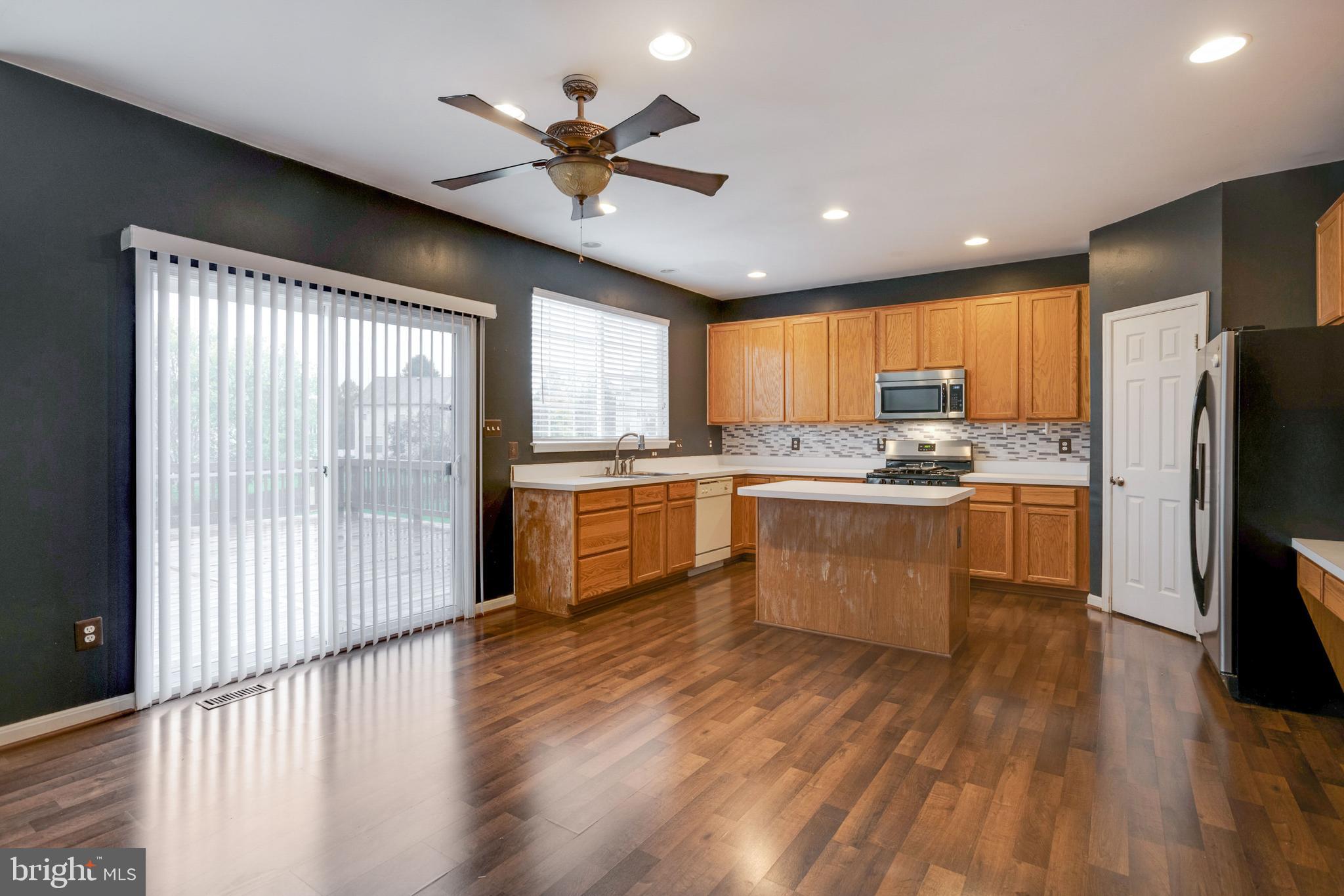 864 Fox Den Road Culpeper, VA 22701 - Photo 21 of 66 Eat-in kitchen with access to deck and rear yard