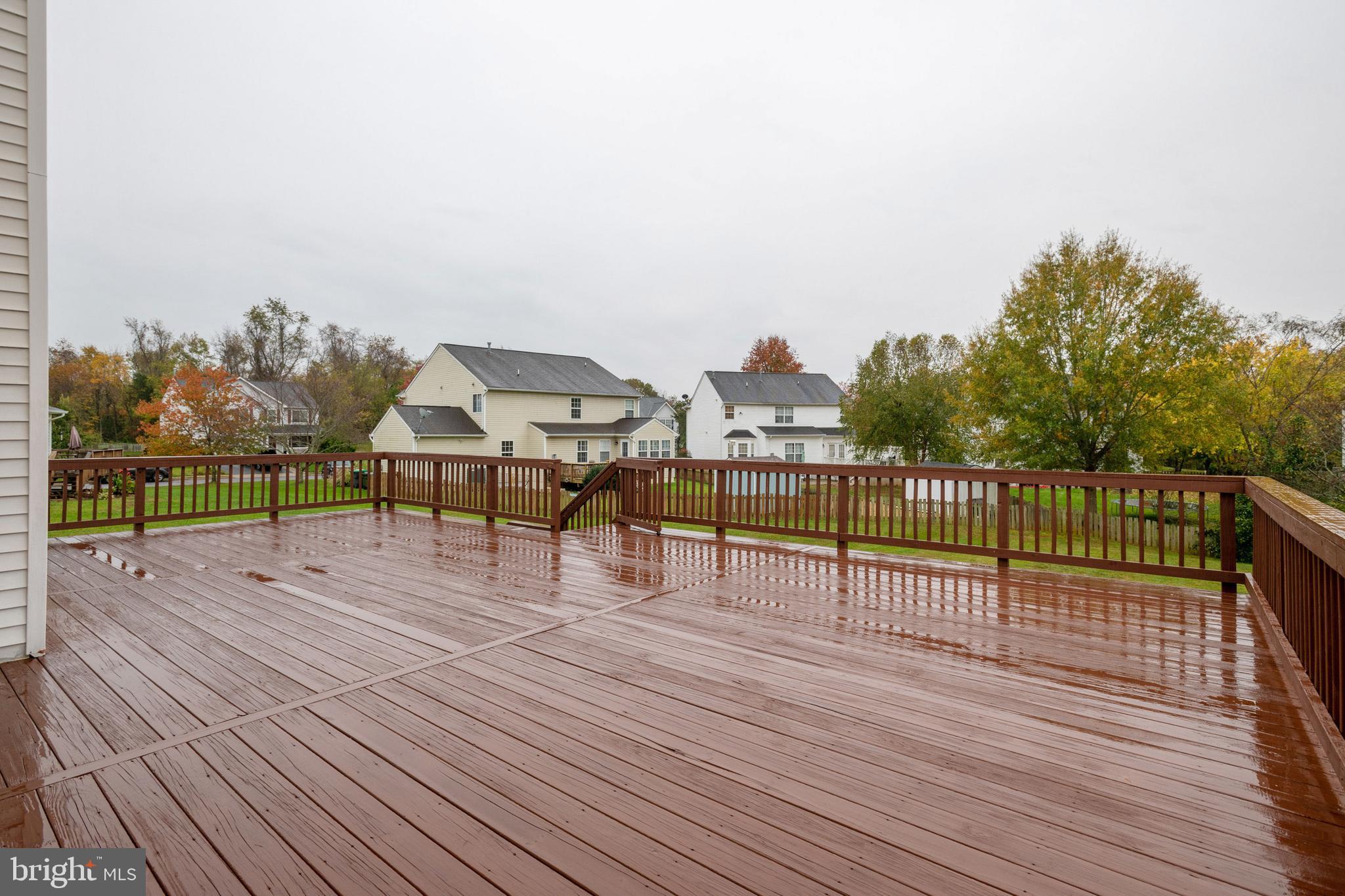 864 Fox Den Road Culpeper, VA 22701 - Photo 57 of 66 Oversized deck in rear fenced yard