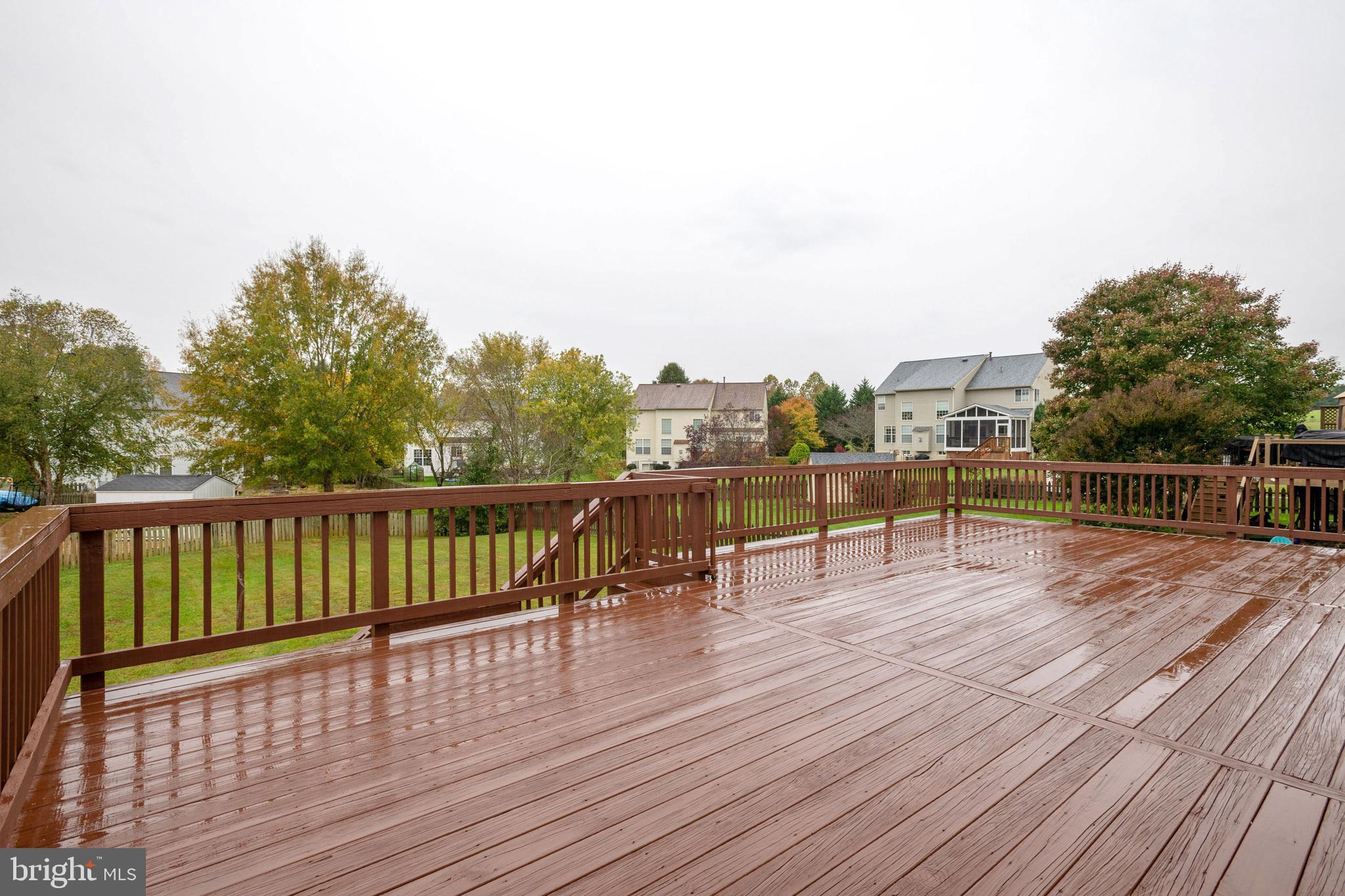 864 Fox Den Road Culpeper, VA 22701 - Photo 58 of 66 Oversized deck in rear fenced yard