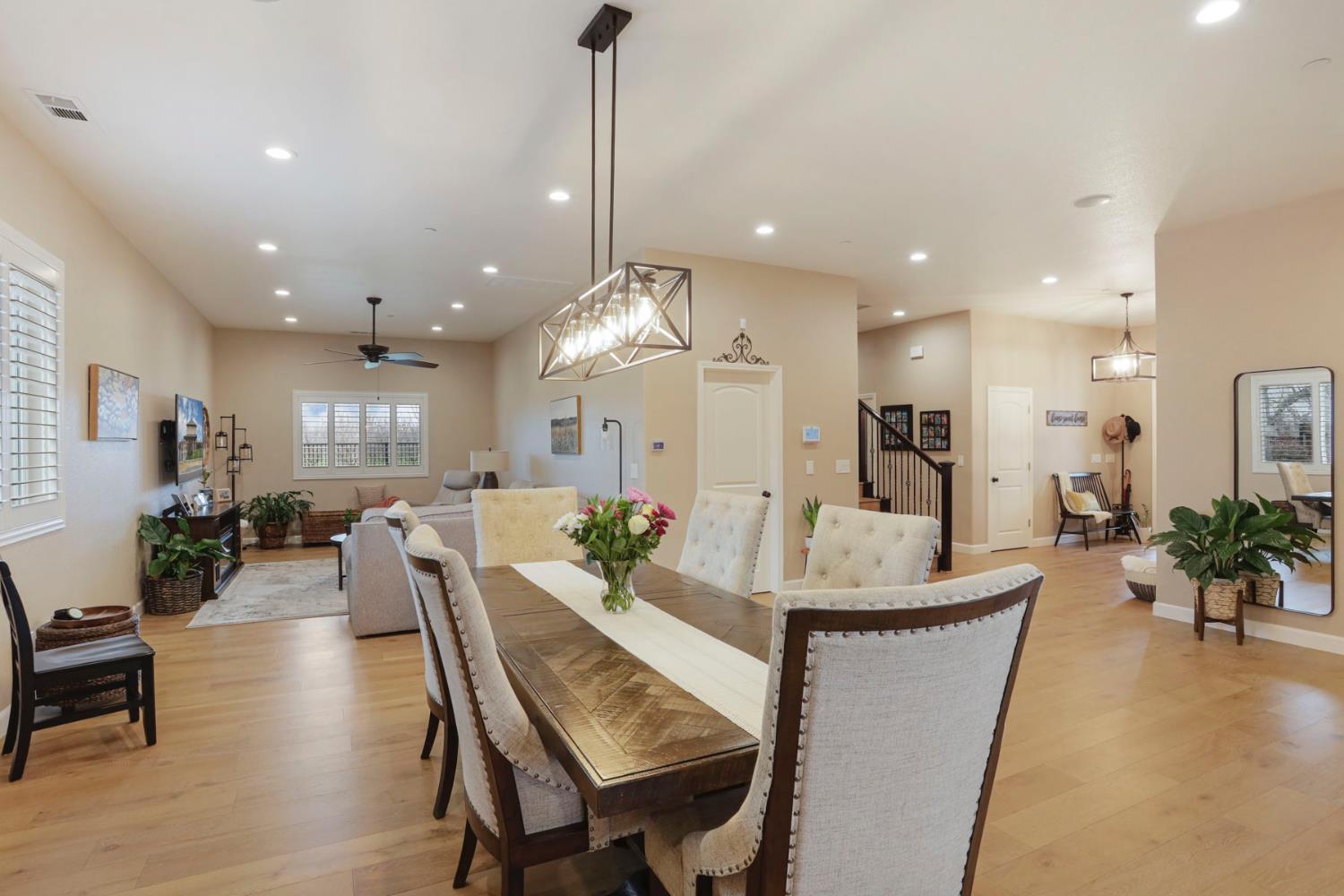 23346 Frederick Road Ripon, CA 95366 - Photo 24 of 96 a dining room with furniture and wooden floor
