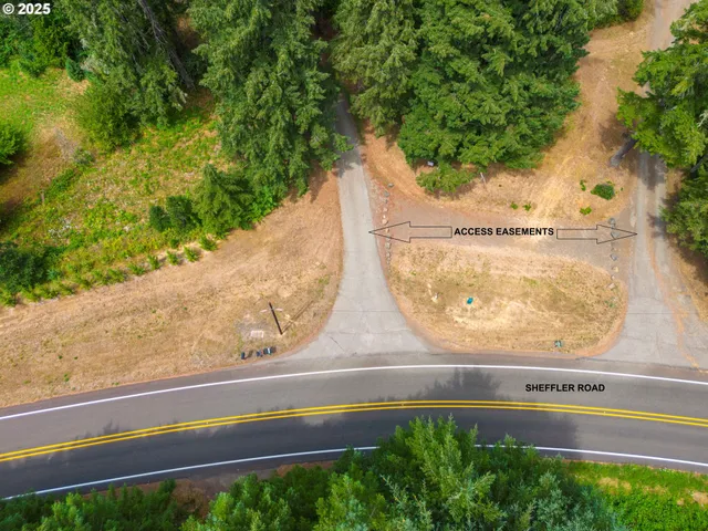 a view of a floor to ceiling window and a yard