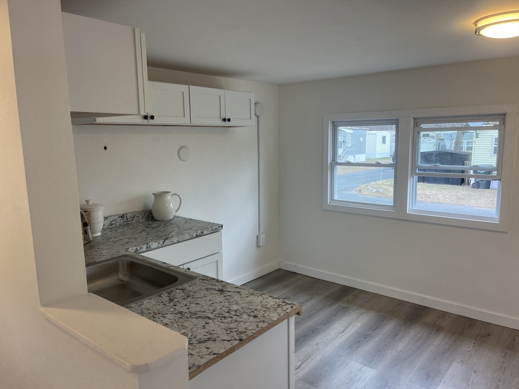32 Better Way Springfield, MA 01119 - Photo 2 of 7 a view of a kitchen cabinets and a window