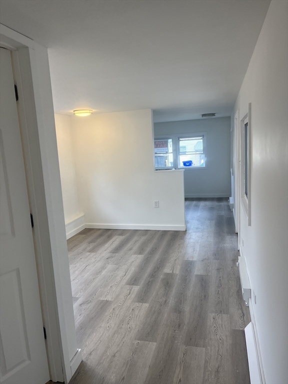 32 Better Way Springfield, MA 01119 - Photo 4 of 7 wooden floor in an empty room with a window