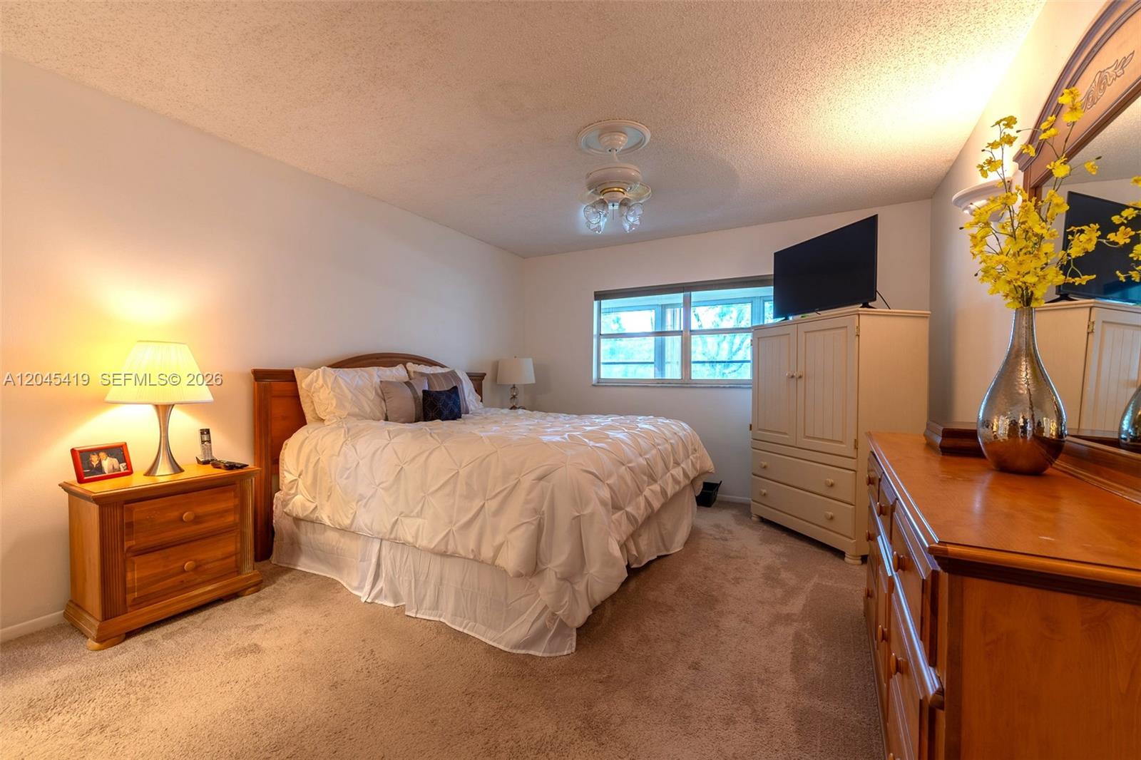 8814 West McNab Road, Unit 204 Tamarac, FL 33321 - Photo 19 of 23 Master Bedroom
