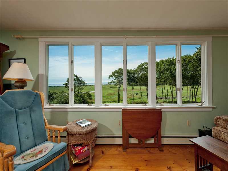 20 Seapoint Road Kittery, ME 03905 - Photo 5 of 19 Living Room. Highlighted by a wood...