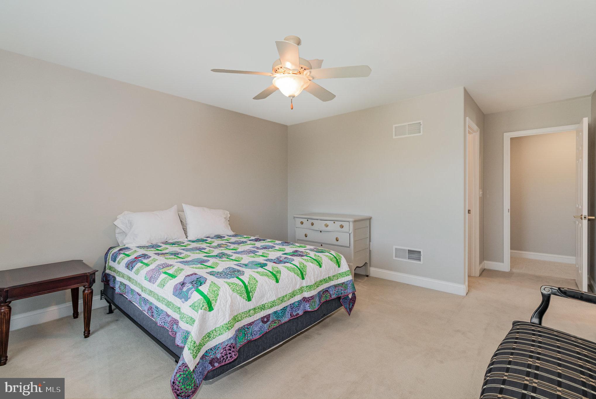 140 Madara Drive Hanover, PA 17331 - Photo 25 of 57 a bedroom with a bed and a chandelier