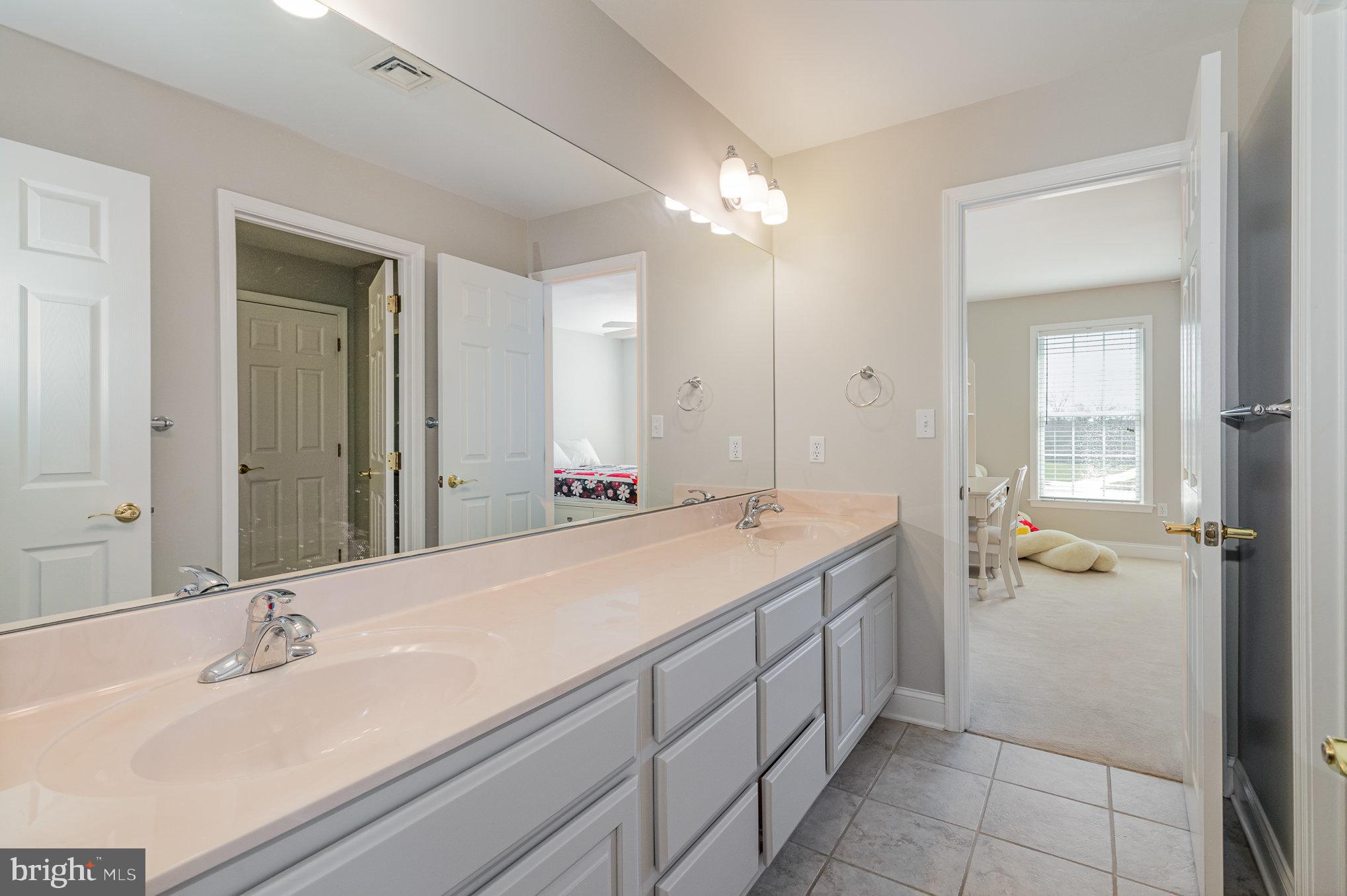 140 Madara Drive Hanover, PA 17331 - Photo 27 of 57 a bathroom with a sink and a mirror