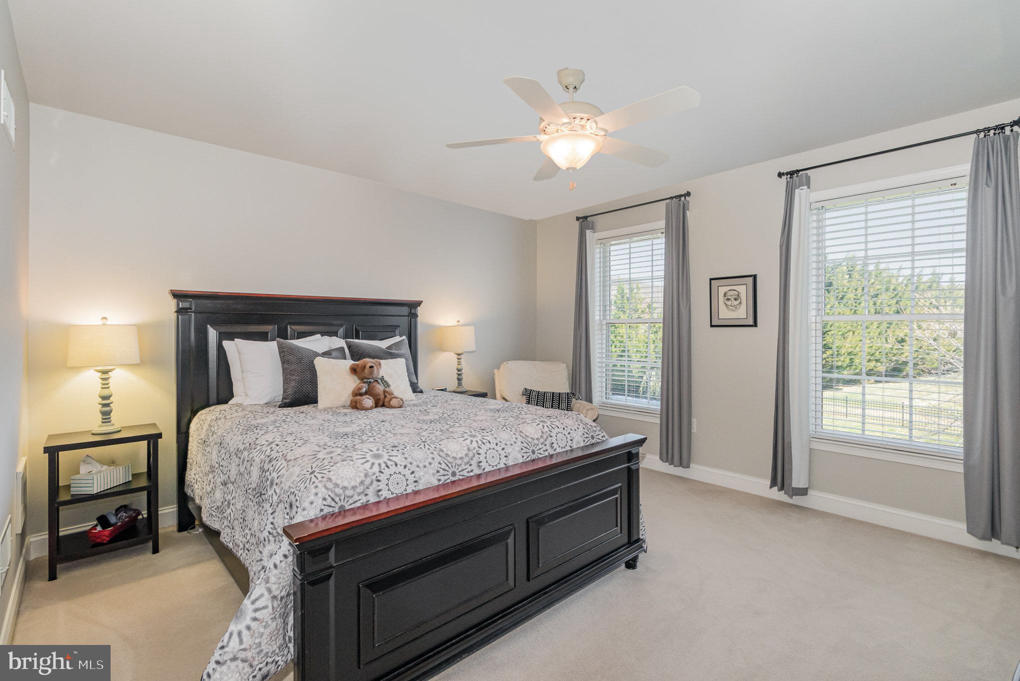 140 Madara Drive Hanover, PA 17331 - Photo 35 of 57 a bedroom with a bed and a chandelier