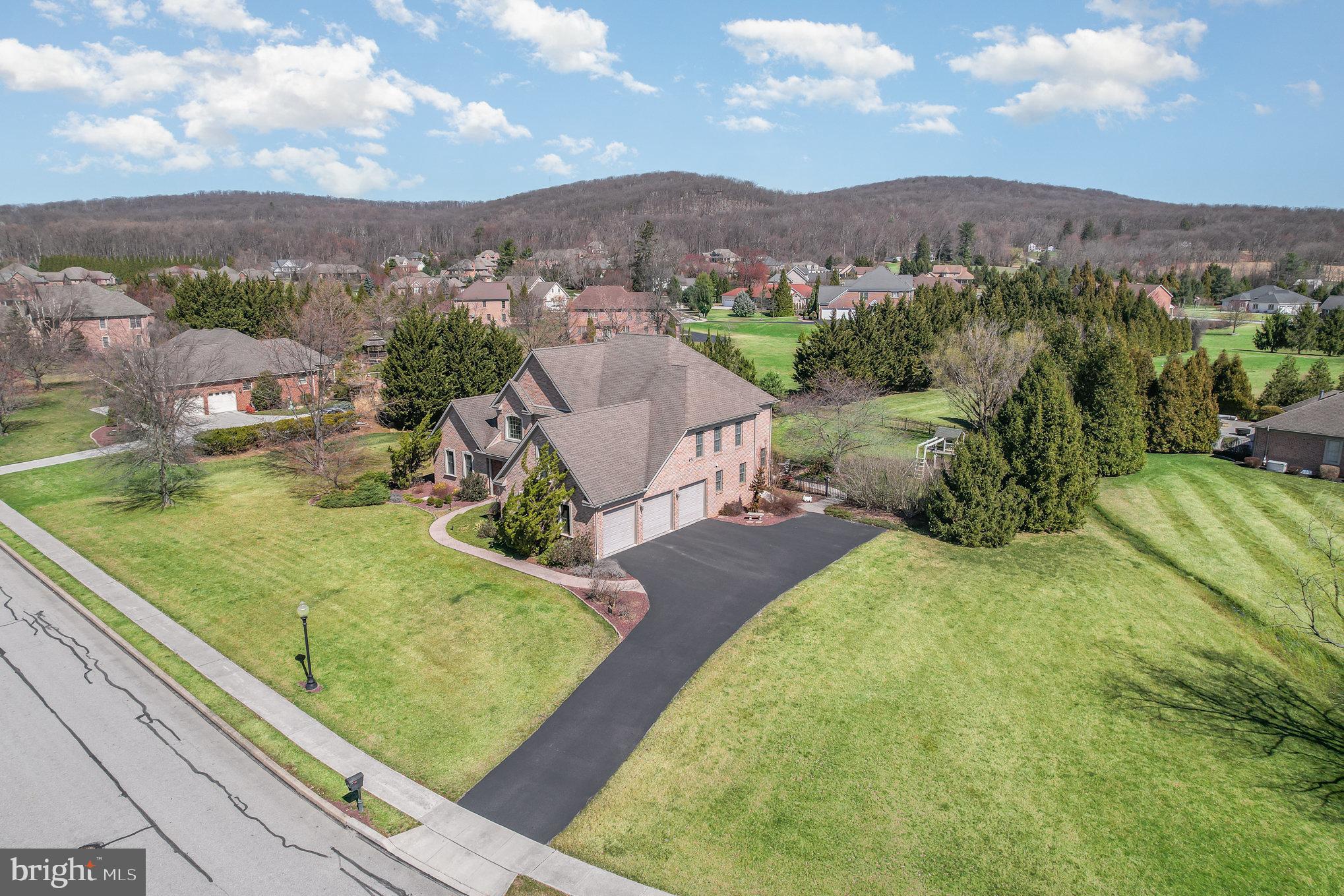 140 Madara Drive Hanover, PA 17331 - Photo 54 of 57 a view of a garden with mountains in the background