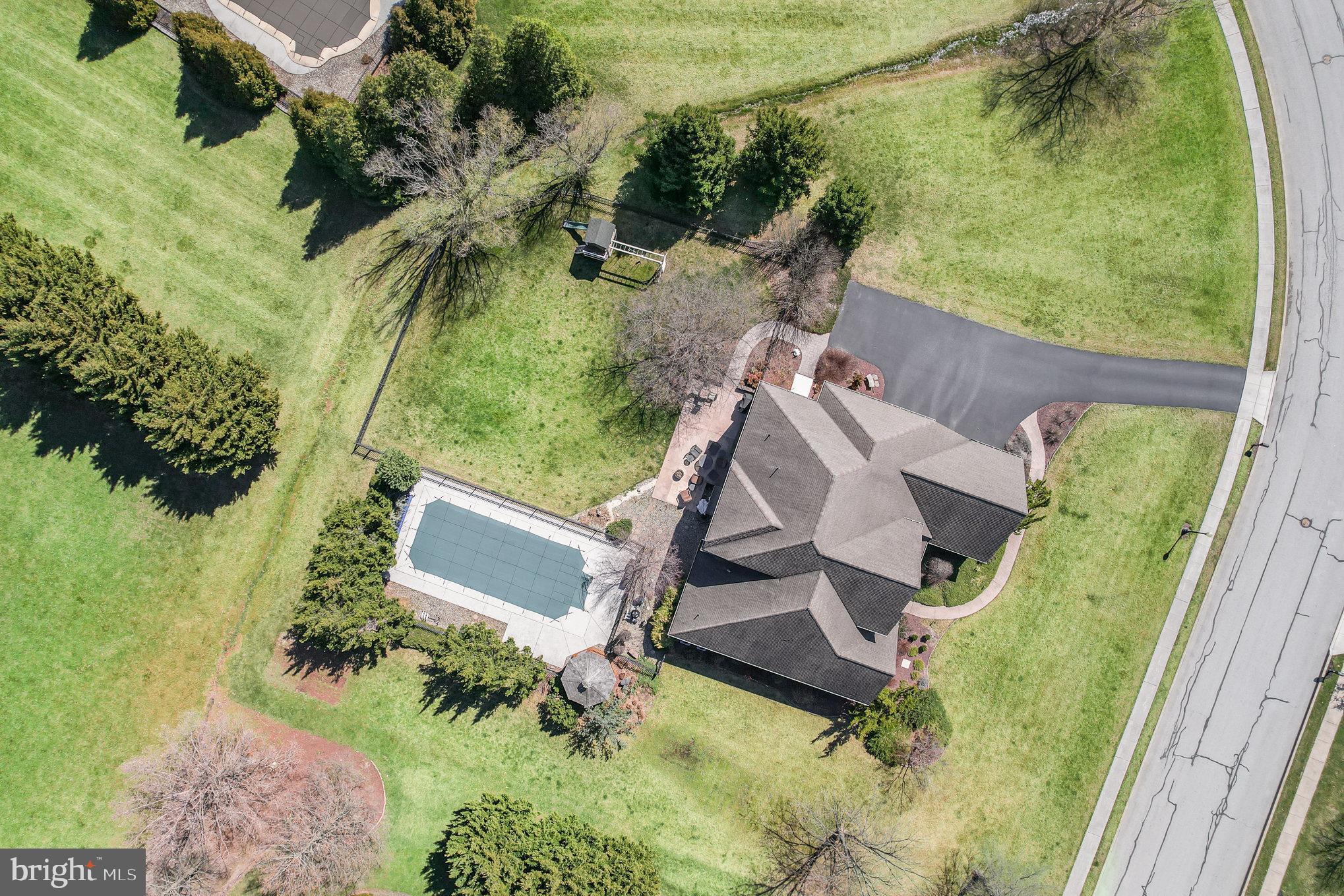 140 Madara Drive Hanover, PA 17331 - Photo 55 of 57 an aerial view of a house with outdoor space and a lake view
