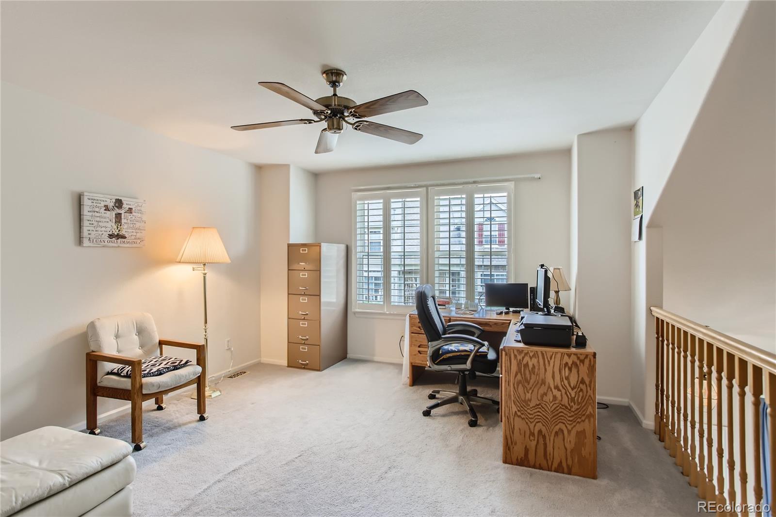 6247 Trailhead Road Highlands Ranch, CO 80130 - Photo 20 of 28 a workspace with furniture and window