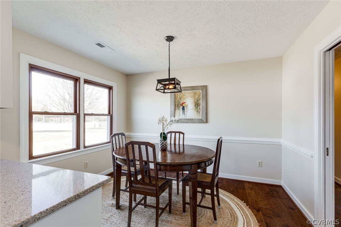 11054 Georgetown Road Mechanicsville, VA 23116 - Photo 11 of 50 a view of a dining room with furniture window and outside view