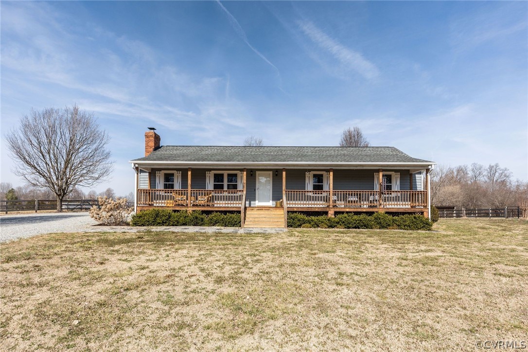 11054 Georgetown Road Mechanicsville, VA 23116 - Photo 2 of 50 a front view of a house with a yard