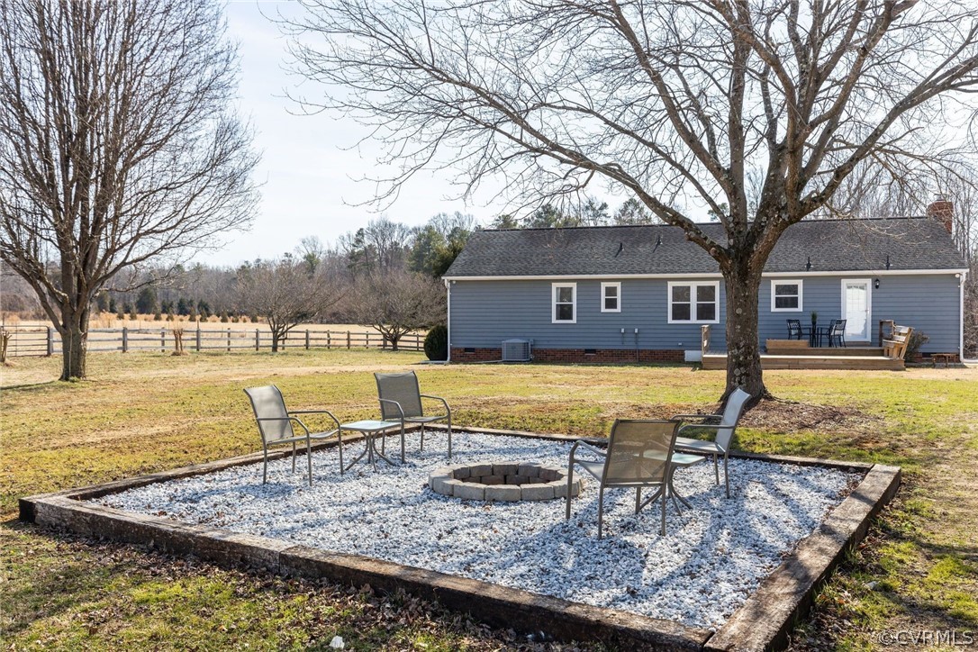 11054 Georgetown Road Mechanicsville, VA 23116 - Photo 31 of 50 a view of a house with swimming pool and a yard