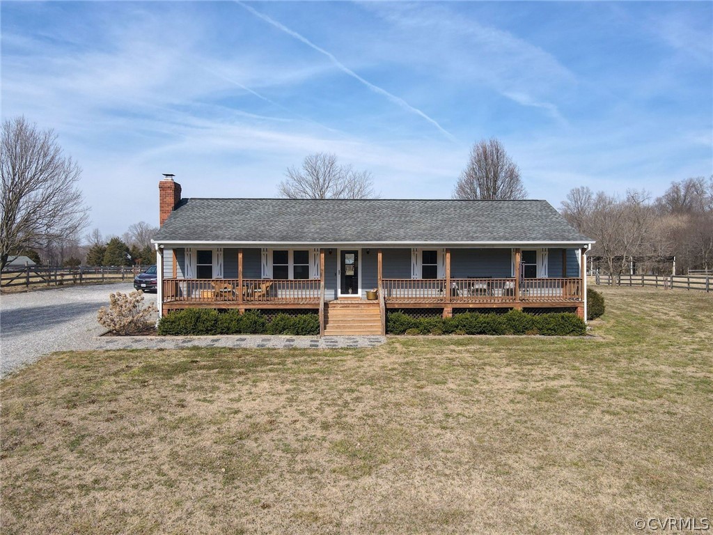 11054 Georgetown Road Mechanicsville, VA 23116 - Photo 49 of 50 a front view of a house with a yard