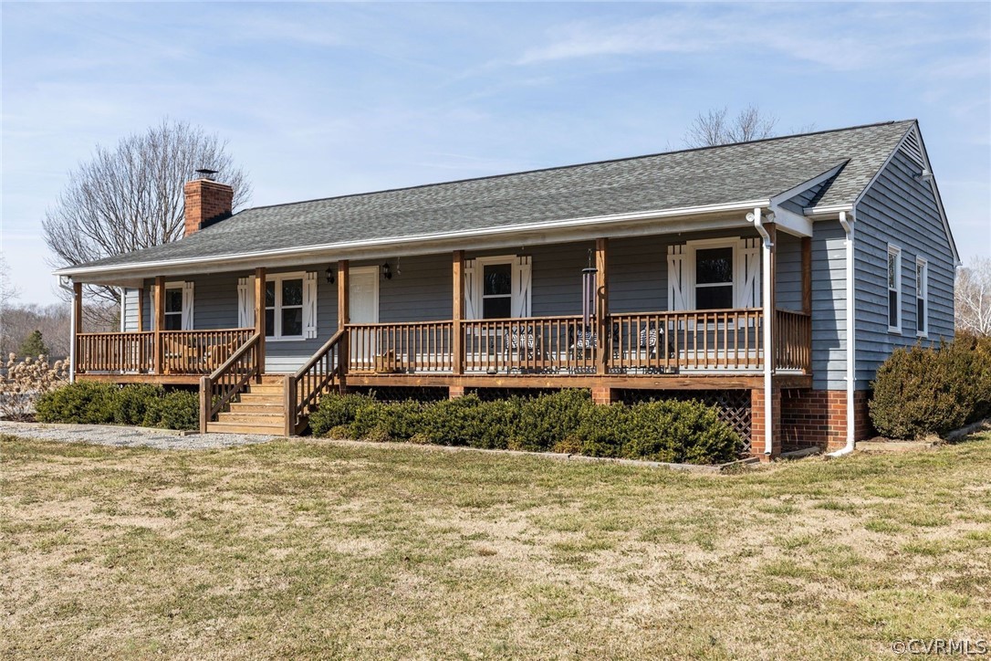 11054 Georgetown Road Mechanicsville, VA 23116 - Photo 50 of 50 a front view of a house with garden