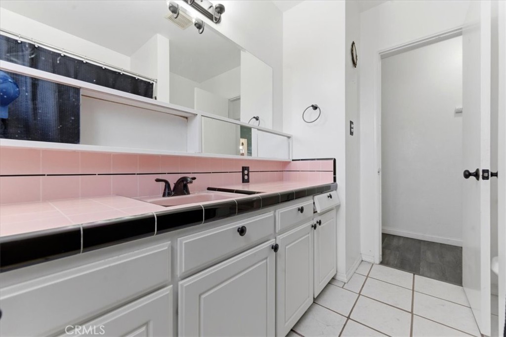 34863 Wildwood Canyon Road Yucaipa, CA 92399 - Photo 12 of 22 a view of a sink and mirror